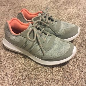 Silver and grey adidas running shoes
